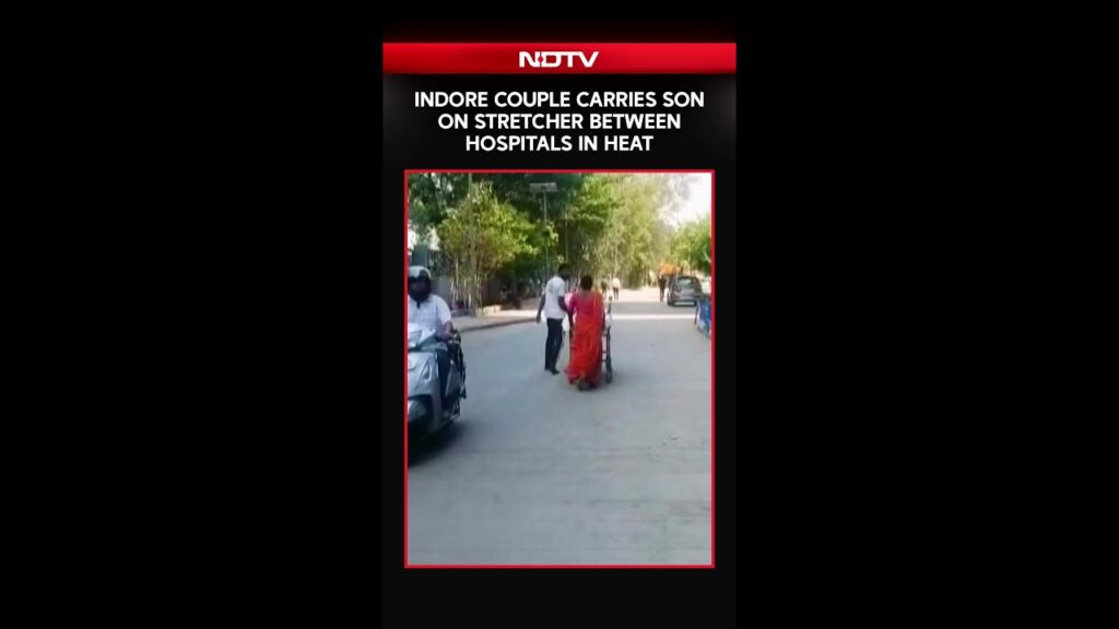 Indore Couple Carries Son On Stretcher Between Hospitals In Heat