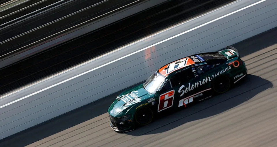 Brad Keselowski drives at Michigan.