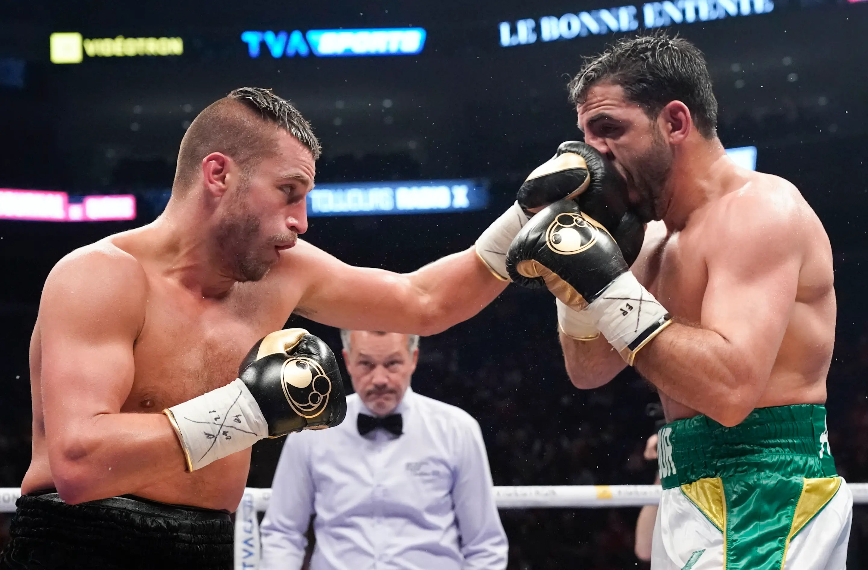 QUEBEC CITY, QC - MAY 26: David Lemieux of Canada punches Karim Achour of France during their middleweight fight at the Videotron Center on May 26, 2018 in Quebec City, Quebec, Canada. (Photo by Mathieu Belanger/Getty Images)