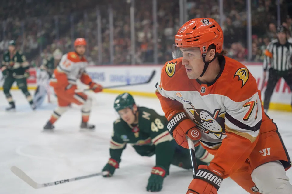 Apr 14, 2026; Saint Paul, Minnesota, USA; Anaheim Ducks right wing Frank Vatrano (77) plays the puck by the boards in the first period against the Minnesota Wild at Grand Casino Arena. Mandatory Credit: Matt Blewett-Imagn Images