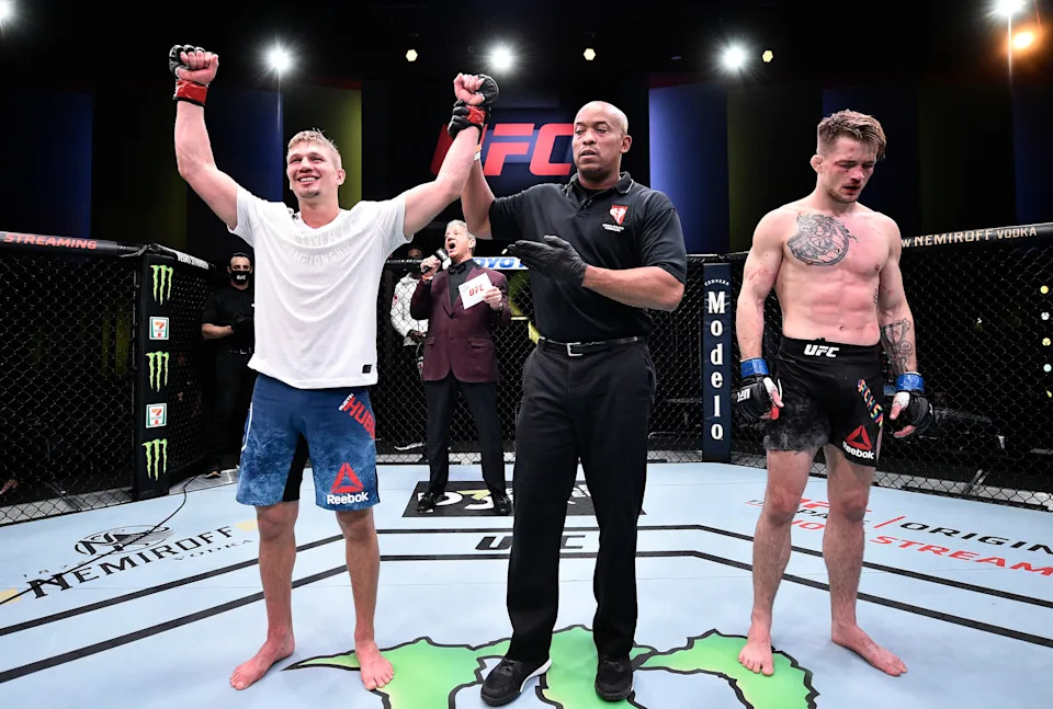 LAS VEGAS, NEVADA - JUNE 20: In this handout image provided by UFC, Austin Hubbard celebrates after his victory over Max Rohskopf in their lightweight bout during the UFC Fight Night event at UFC APEX on June 20, 2020 in Las Vegas, Nevada. (Photo by Chris Unger/Zuffa LLC via Getty Images)
