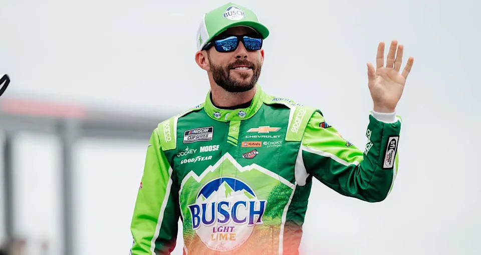 Ross Chastain waves to fans during driver introductions at Pocono Raceway