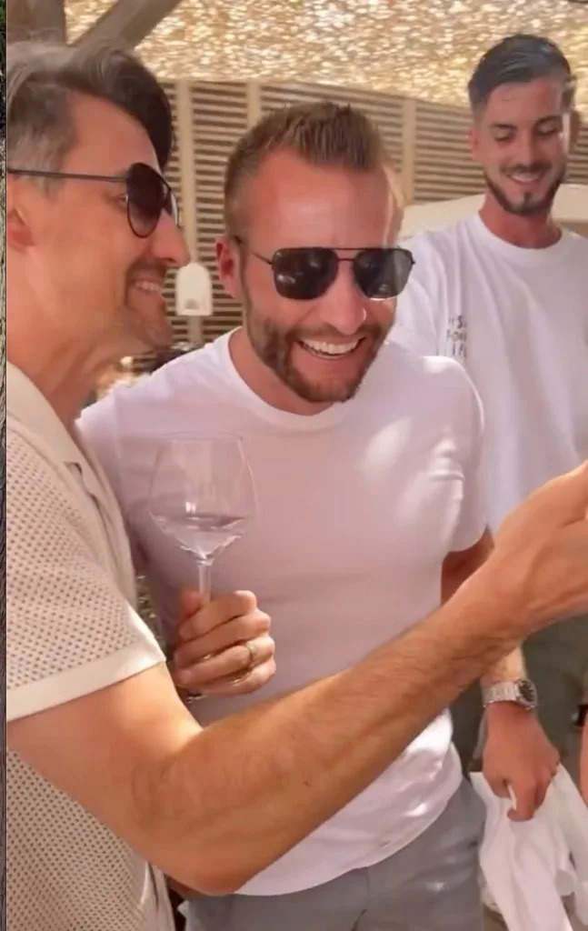 Rams coach Sean McVay is all smiles after a 49ers fan buys him a bottle of champagne. Instgram/blakecmccall
