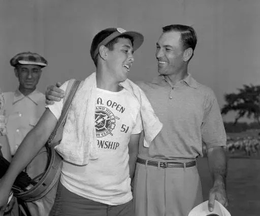 Ben Hogan, right, hugs his caddy, Dave Press, after winning the U.S. Open golf tournament in Birmingham, Mich. on June 16, 1951.