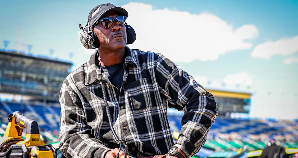 Michael Jordan, co-owner of 23XI Racing, looks on at a NASCAR race.