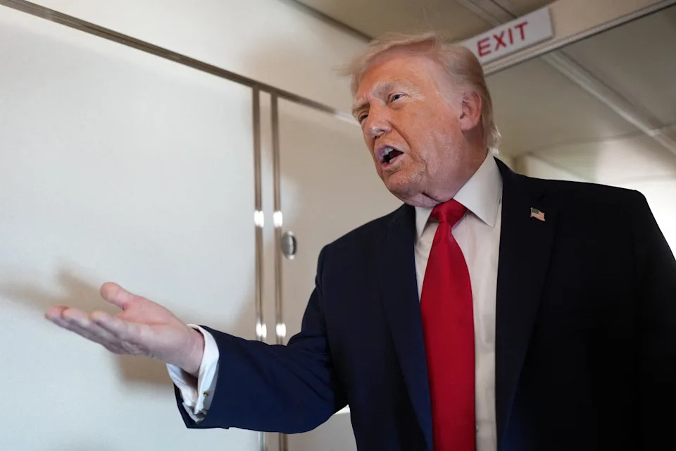 President Donald Trump speaks to members of the media on board Air Force One while flying from Joint Base Andrews to Chippewa Valley Regional Airport in Eau Claire, Wisconsin, U.S., June 5, 2026.