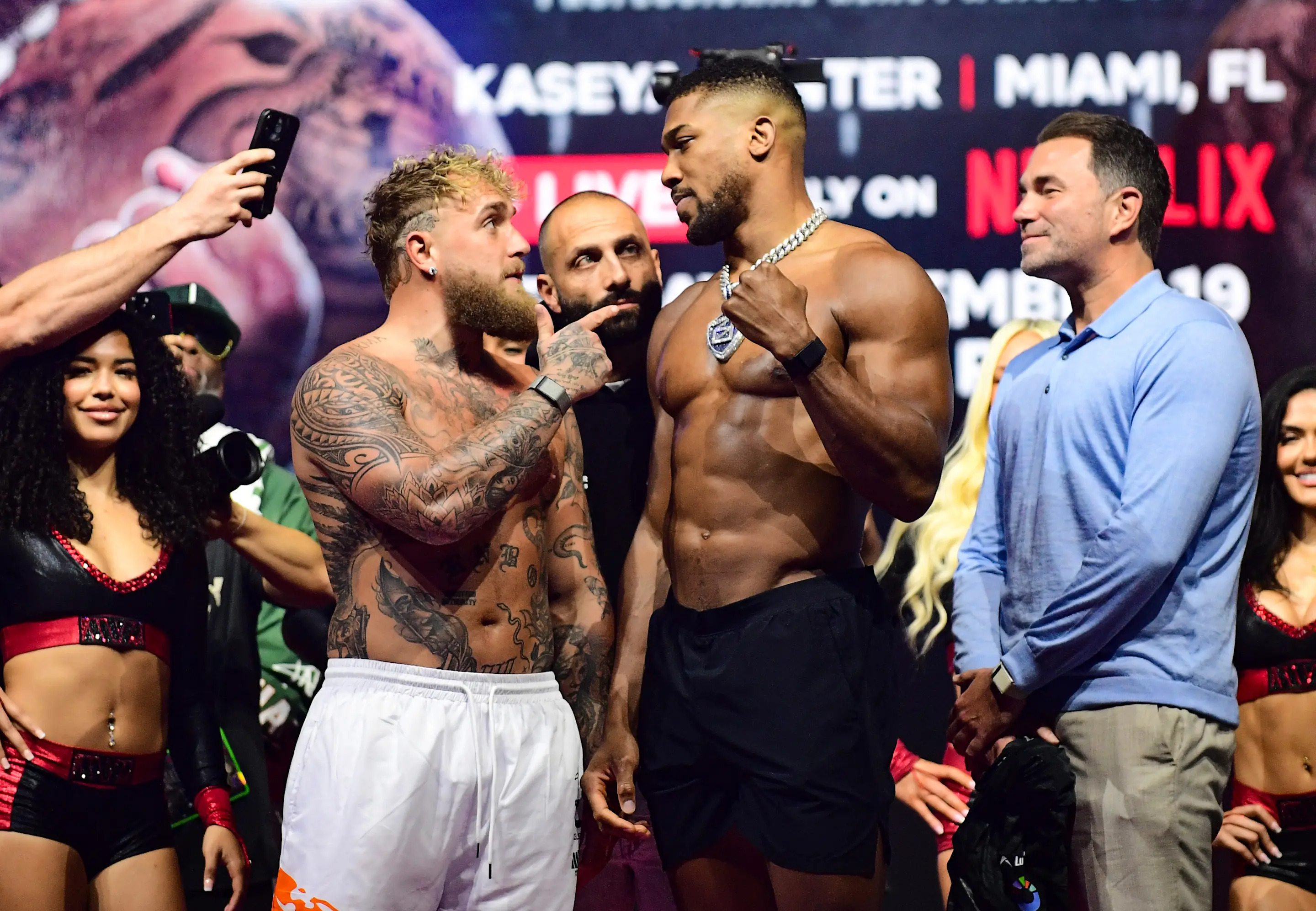 Jake Paul and Anthony Joshua during a public weigh-in at the Fillmore Miami Beach, Florida. Anthony Joshua will take on YouTuber-turned-boxer Jake Paul in a heavyweight bout in Miami on December 19. Picture date: Thursday December 18, 2025. (Photo by JC Ruiz/PA Images via Getty Images)