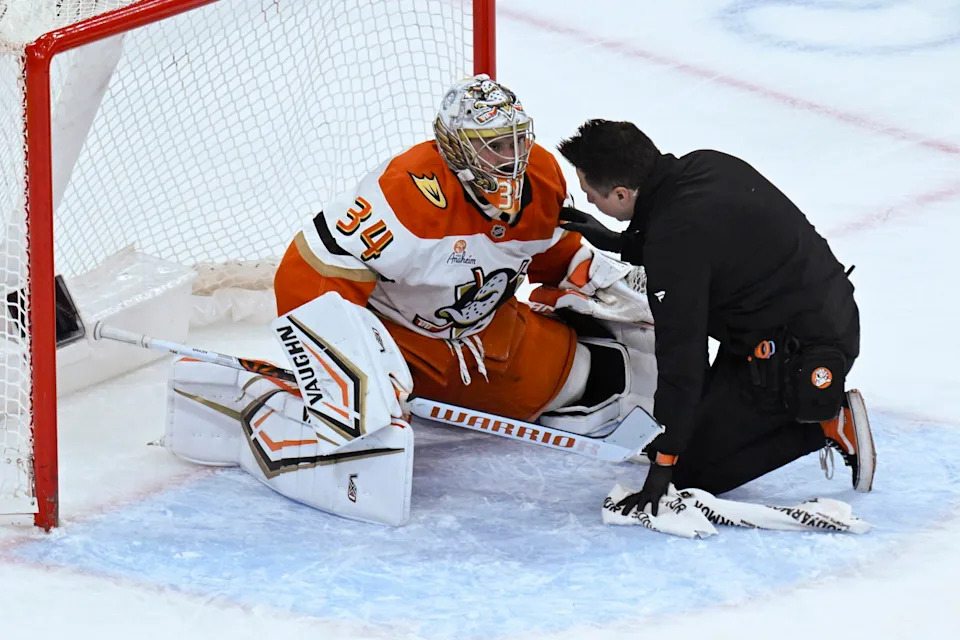 Nov 30, 2025; Chicago, Illinois, USA; Anaheim Ducks goaltender Petr Mrazek (34) talks with a team member after being injured during the third period against the Chicago Blackhawks at United Center. Mandatory Credit: Matt Marton-Imagn Images