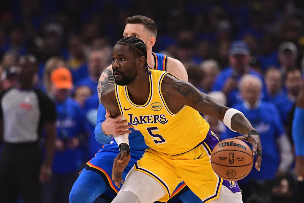 Ex-Arizona center Deandre Ayton exercises player option to remain with Lakers