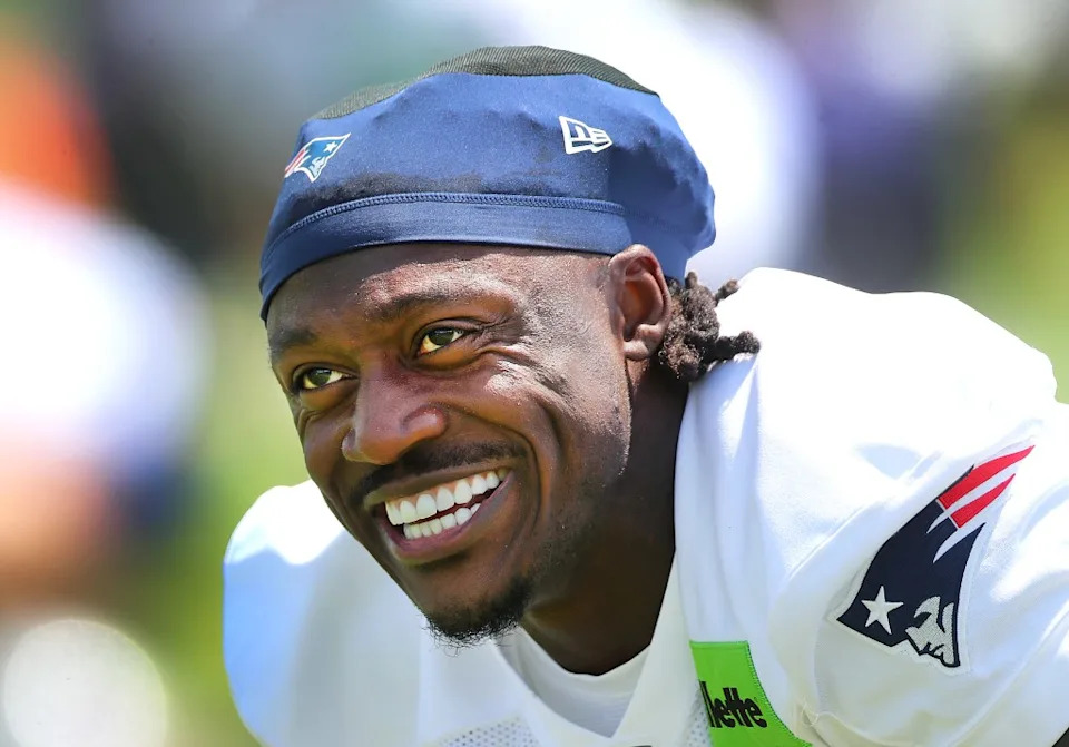 A.J. Brown smiles during Patriots practice on June 2, 2026. Boston Globe via Getty Images