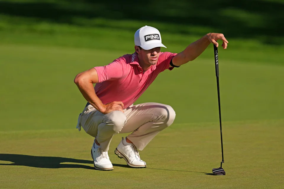 Alex Smalley lines up a putt on the first green during the first round of the 2026 Memorial Tournament at Muirfield Village Golf Club.