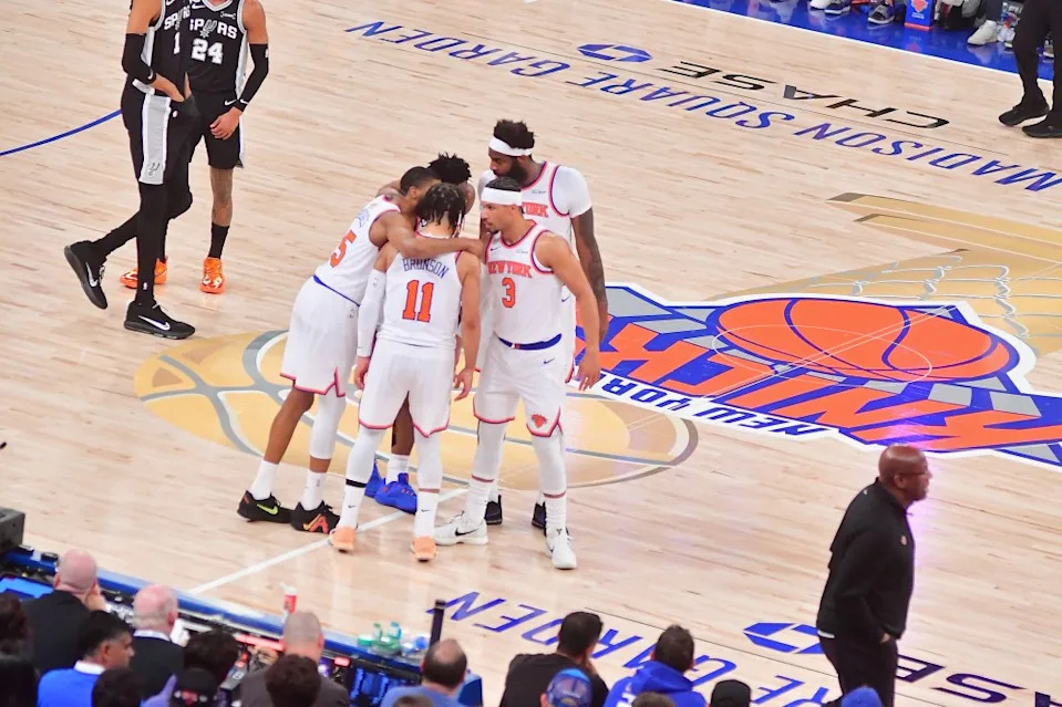 The New York Knicks huddle during a game against the San Antonio Spurs in Game 4 of the NBA Finals. NBAE via Getty Images