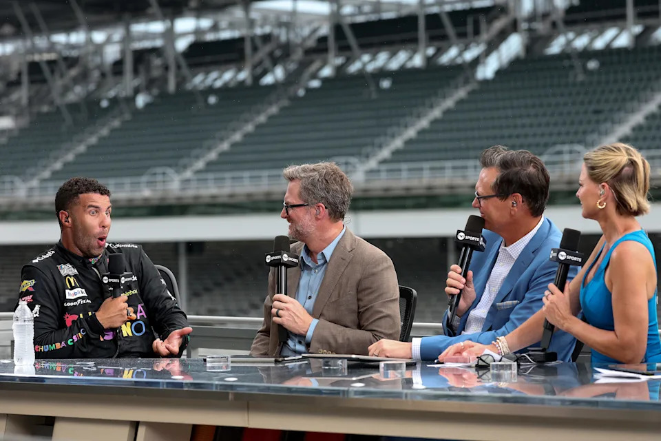 Bubba Wallace, driver of the No. 23 Chumba Casino Toyota, is interviewed on the set of NASCAR on TNT Sports by Dale Earnhardt Jr. and Steve Letarte after winning the winning the NASCAR Cup Series Brickyard 400 Presented by PPG at Indianapolis Motor Speedway on July 27, 2025.