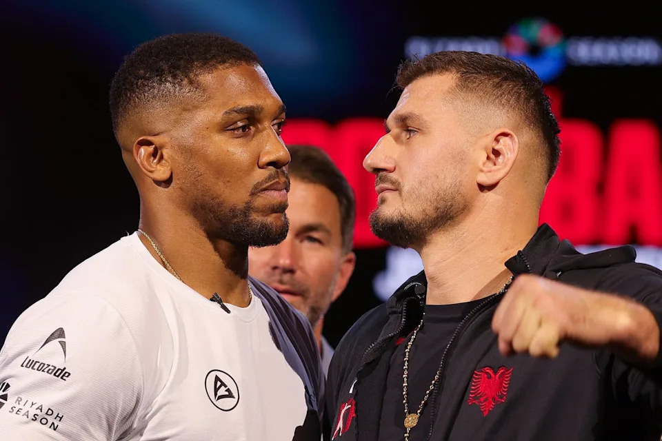 Joshua facing off with his July opponent Kristian Prenga (Getty)