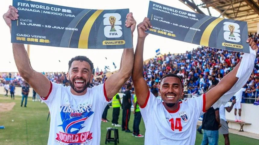 Roberto Lopes (left) celebrates Cape Verde's World Cup qualification with Deroy Duarte after victory over Eswatini