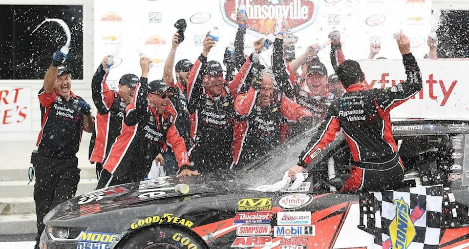 Jeremy Clements celebrates with his No. 51 crew after his first O
