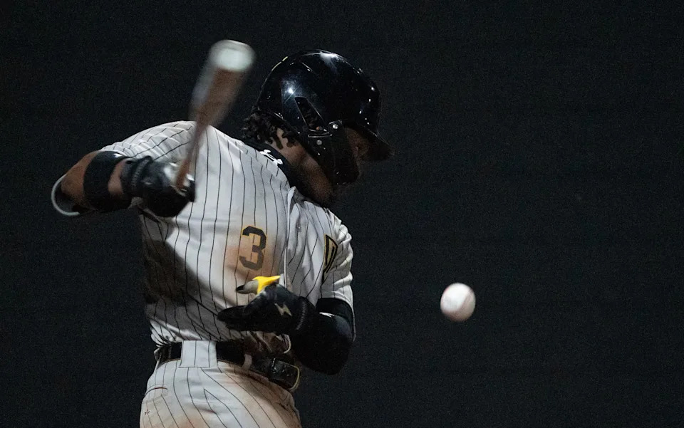 Oak Grove player Eric Booth Jr. (3) hits the ball during the game against Northwest Rankin in Flowood, Miss., on Tuesday, March 24, 2026.