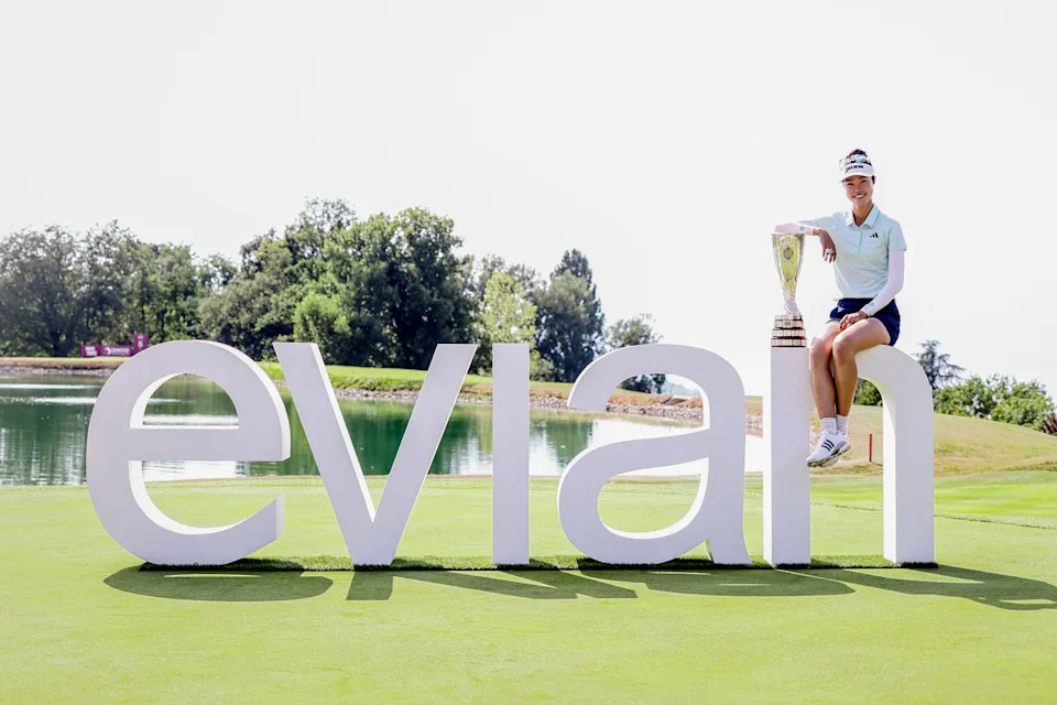 Australia's Grace Kim poses with the trophy after her victory on the first playoff hole after the final round of the Amundi Evian Championship at Evian Resort Golf Club, in Evian-Les-Bains, eastern France on July 13, 2025.