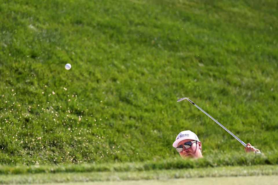 Ben Griffin plays a shot from a bunker on the 17th hole during the first round of the 2026 Memorial Tournament at Muirfield Village Golf Club.