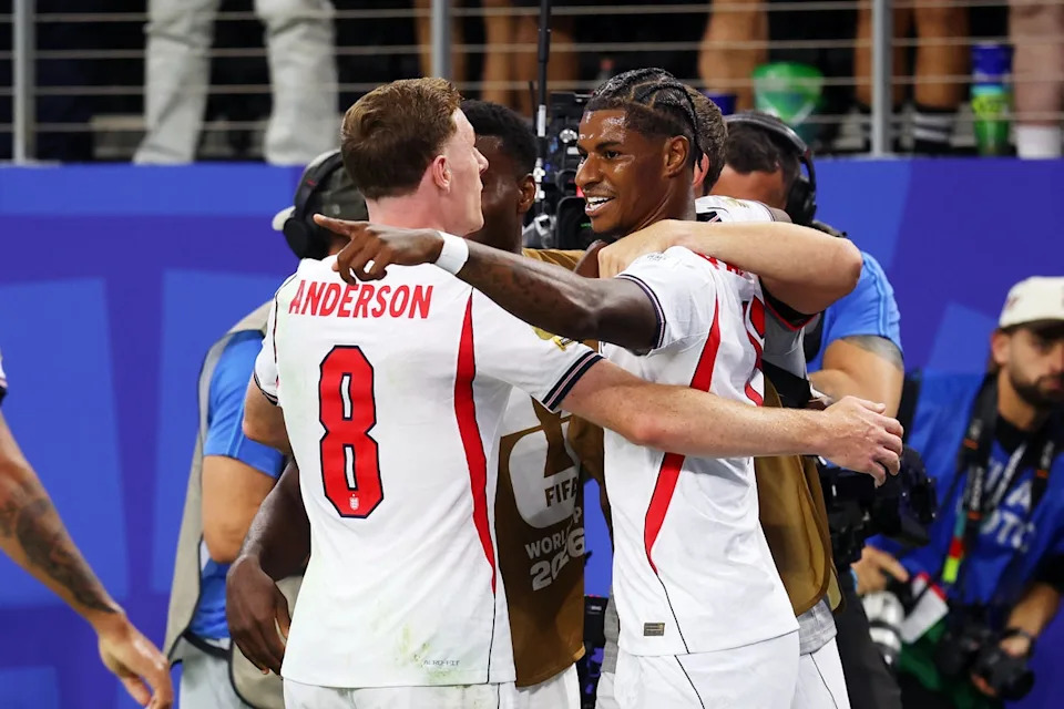 Marcus Rashford #11 of England celebrates with teammate Elliot Anderson #8 after scoring his team's fourth goal (Getty)