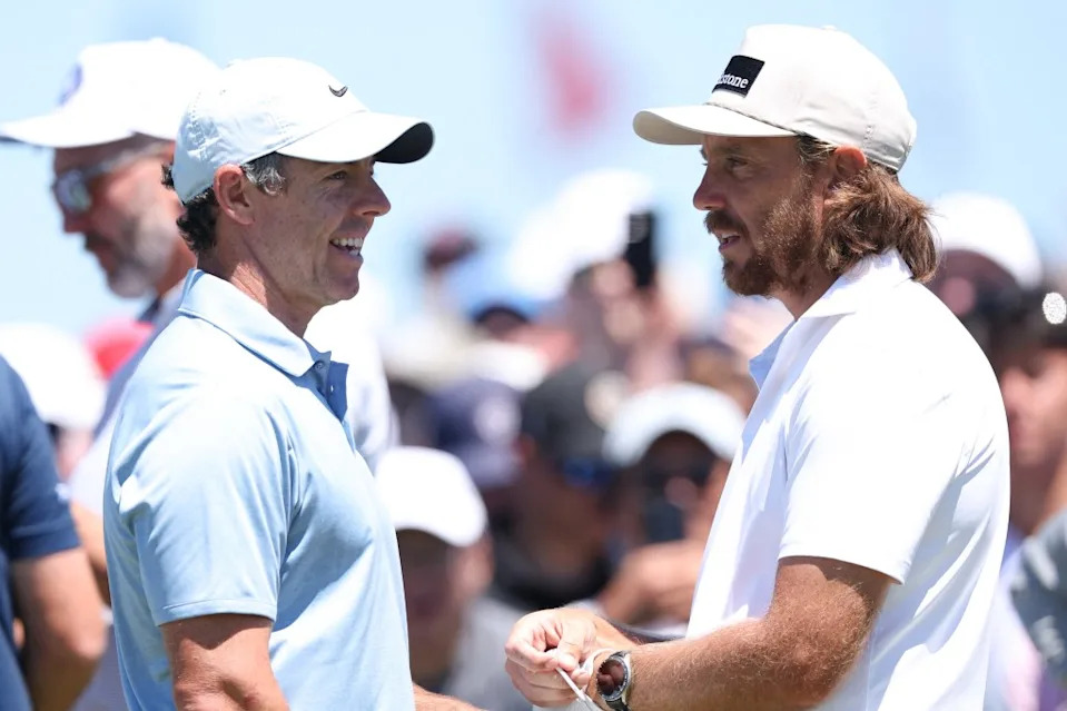 Rory McIlroy (left) talks with Ryder Cup teammate Tommy Fleetwood during their U.S. Open practice round on June 16, 2026. Bill Streicher-Imagn Images