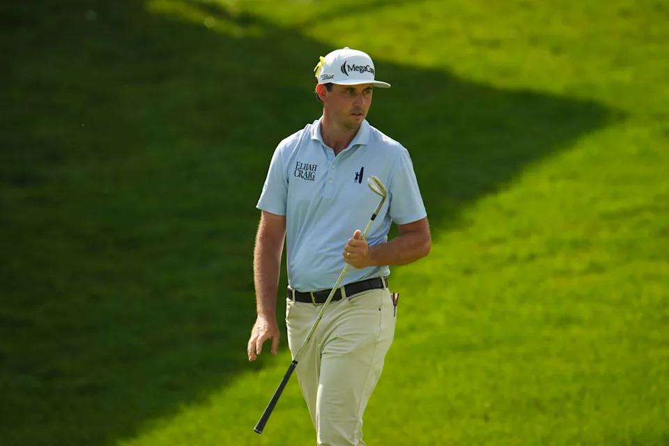 J.T. Poston walks around the 17th green during the continuation of the third round of the Memorial Tournament at Muirfield Village Golf Club on Sunday, June 7, 2026. Play was halted on Saturday due to weather before golfers could finish the round.