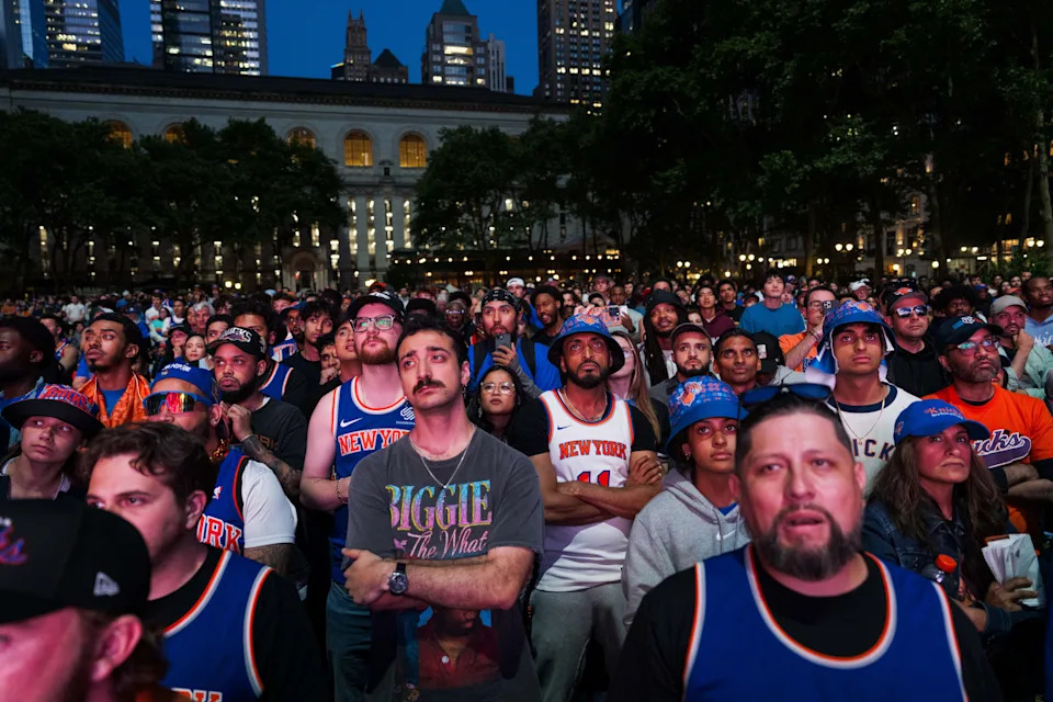 New York Knicks fans gather at Bryant Park to watch Game 3 of the NBA Finals.