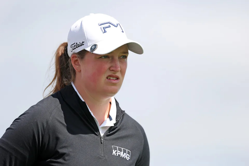 Lottie Woad of England walks from the 11th tee during the first round of the KPMG Women's PGA Championship 2026 at Hazeltine National Golf Club on June 25, 2026 in Chaska, Minnesota. 