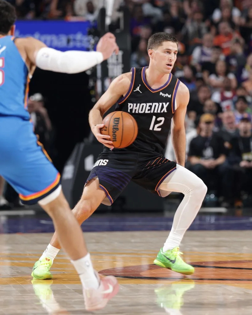 Collin Gillespie of the Phoenix Suns handles the ball during the game against the Oklahoma City Thunder during Round One Game Four on April 27, 2026 at Mortgage Matchup Center in Phoenix, Arizona. NBAE via Getty Images