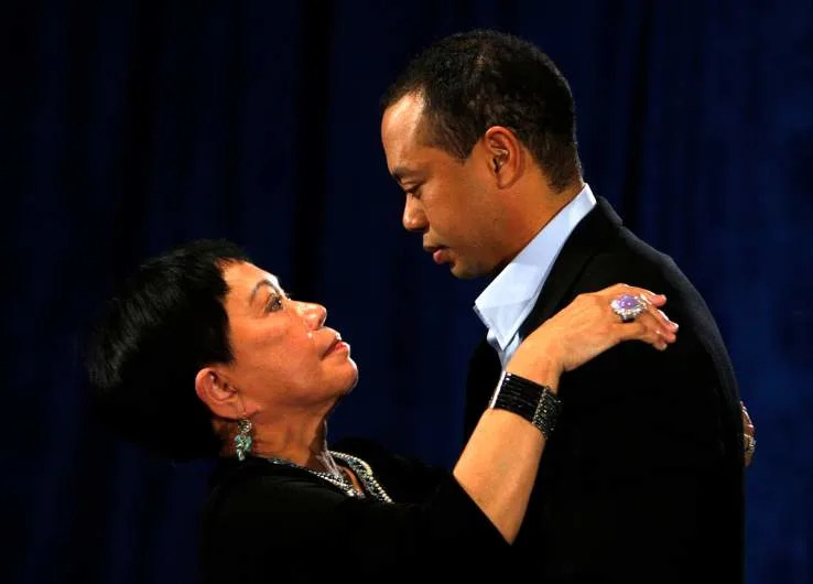 PONTE VEDRA BEACH, FL - FEBRUARY 19:  Tiger Woods talks his mother Kultida following a statement from the Sunset Room on the second floor of the TPC Sawgrass, home of the PGA Tour on February 19, 2010 in Ponte Vedra Beach, Florida. Woods publicly admitted to cheating on his wife Elin Nordegren but maintained that the issues remain 'a matter between a husband and a wife.'  (Photo by Joe Skipper-Pool/Getty Images)