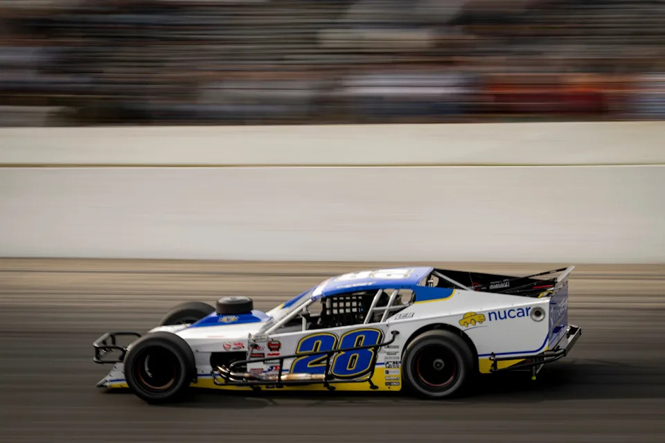 Doug Coby, driver of #28 Nucar Modified races during qualifiers during the Icebreaker 150 for the NASCAR Whelen Modified Tour at Thompson Speedway Motorsports Park on April 12, 2025 in Thompson, Connecticut. (Rachel O‘Driscoll/NASCAR)