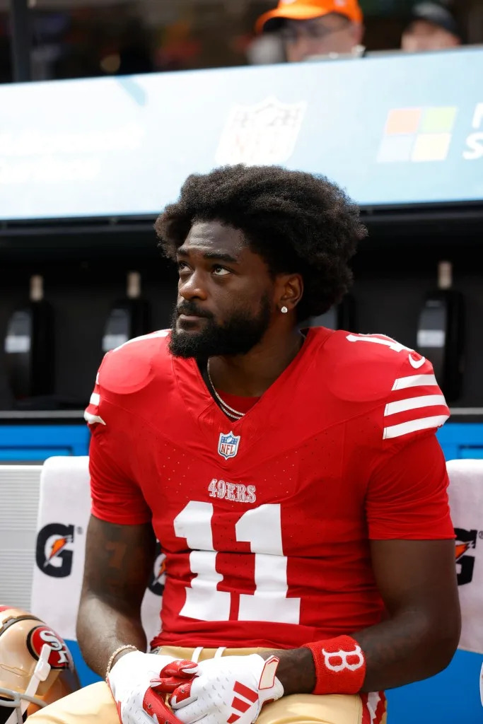 Brandon Aiyuk #11 of the San Francisco 49ers on the sideline before the game against the <a class="link " href="https://sports.yahoo.com/nfl/teams/la-rams/" data-i13n="sec:content-canvas;subsec:anchor_text;elm:context_link" data-ylk="slk:Los Angeles Rams;sec:content-canvas;subsec:anchor_text;elm:context_link;itc:0" data-yga="{"yLinkElement":"context_link","yModuleName":"content-canvas","yLinkText":"Los Angeles Rams","ySubModuleName":"anchor_text","yHasCommerce":false}">Los Angeles Rams</a> Getty Images