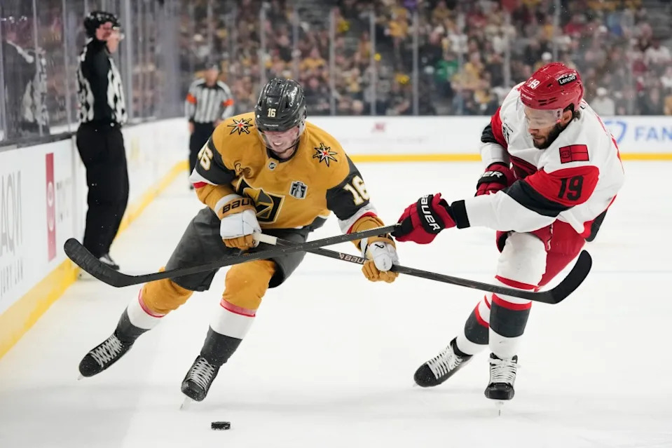 Vegas Golden Knights right wing Pavel Dorofeyev (16) is defended by Carolina Hurricanes defenseman K’andre Miller (19) during the second period in Game 6 of the NHL hockey Stanley Cup Final. AP Photo/John Locher