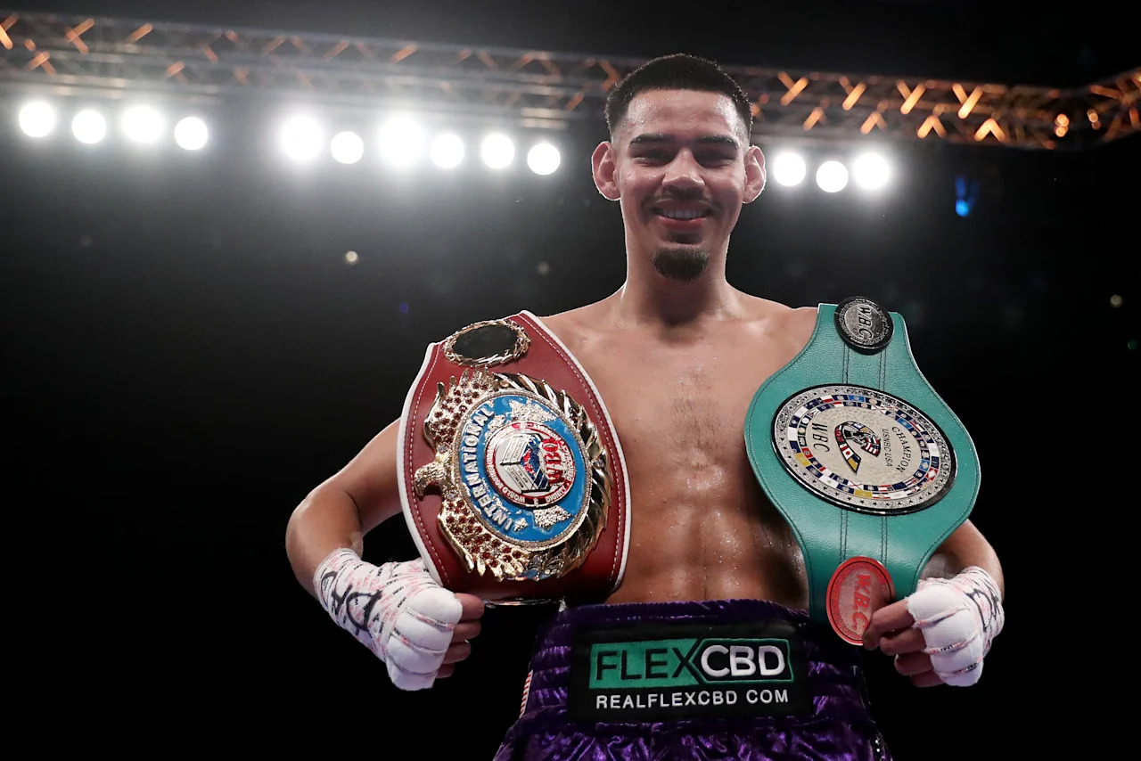 LIVERPOOL, ENGLAND - MARCH 11: Diego Pacheco poses for a photograph with their Title Belts as they celebrate after defeating Jack Cullen during the WBO International Super Middle Title fight between Diego Pacheco and Jack Cullen at M&S Bank Arena on March 11, 2023 in Liverpool, England. (Photo by Lewis Storey/Getty Images)