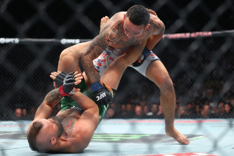 McGregor says knee fine before first-kick injury, vows return McGregor says knee fine before first-kick injury, vows return