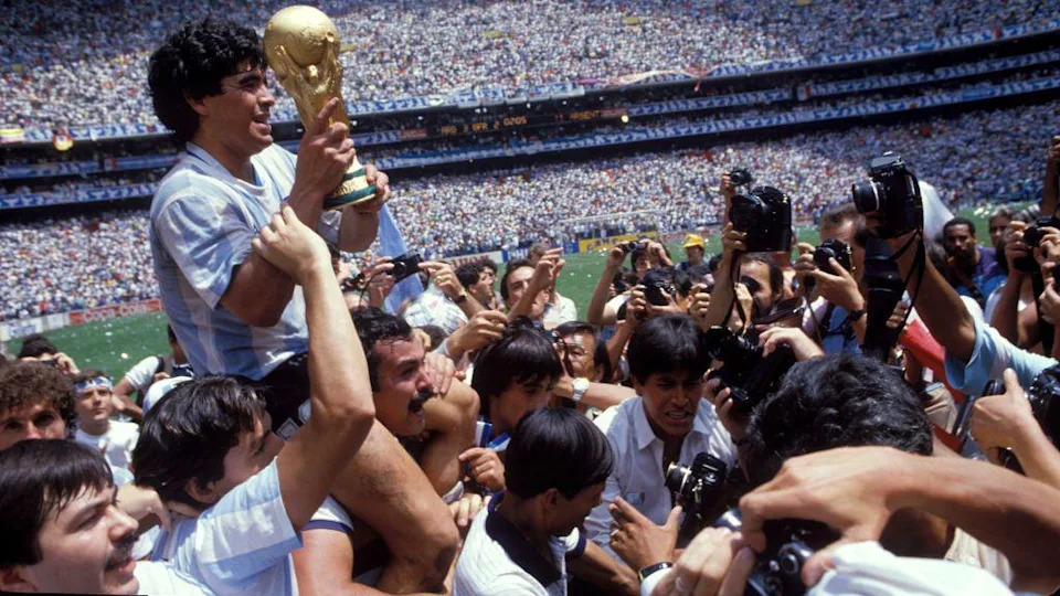 Maradona celebrates with World Cup 1986