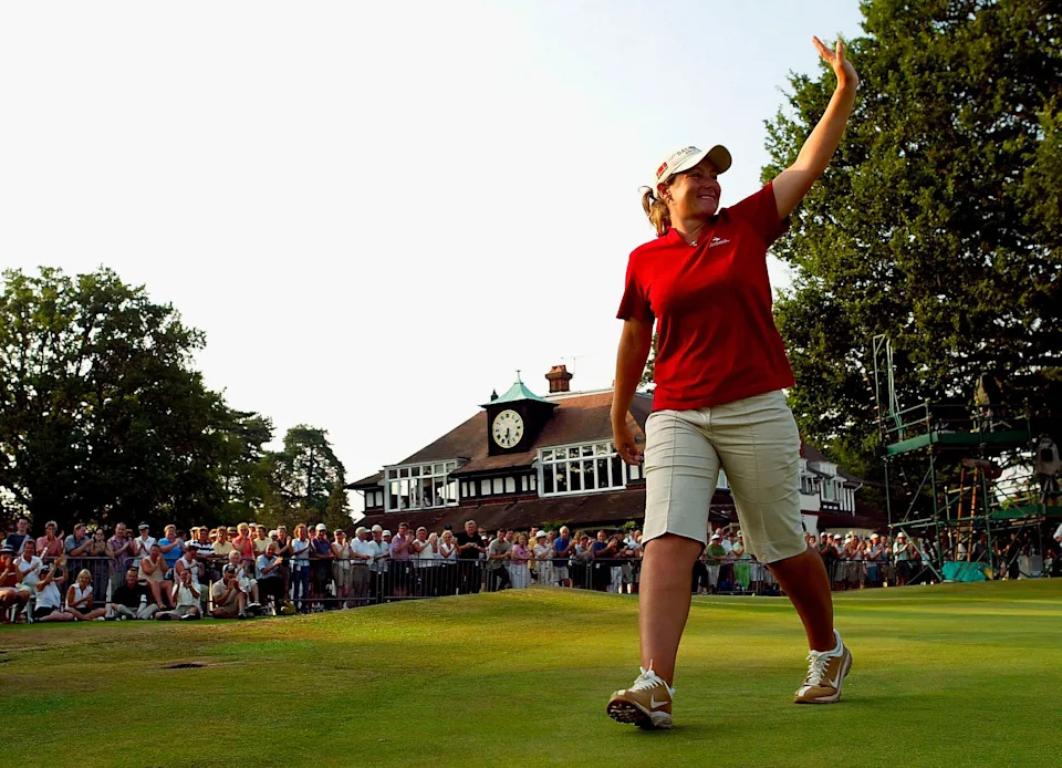Karen Stupples of England acknowledges the crowd after winning the Weetabix Womens British Open with a score of 19 under par, at Sunningdale Golf Club on August 1, 2004 in Sunningdale, England.