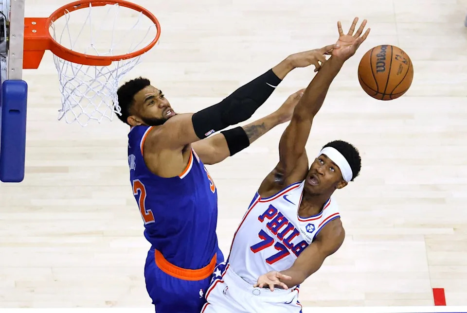 Knicks center <a class="link " href="https://sports.yahoo.com/nba/players/5432/" data-i13n="sec:content-canvas;subsec:anchor_text;elm:context_link" data-ylk="slk:Karl-Anthony Towns;sec:content-canvas;subsec:anchor_text;elm:context_link;itc:0" data-yga="{"yLinkElement":"context_link","yModuleName":"content-canvas","yLinkText":"Karl-Anthony Towns","ySubModuleName":"anchor_text","yHasCommerce":false}">Karl-Anthony Towns</a> (32) blocks a shot by 76ers guard Vj Edgecombe. Jason Szenes for the New York Post