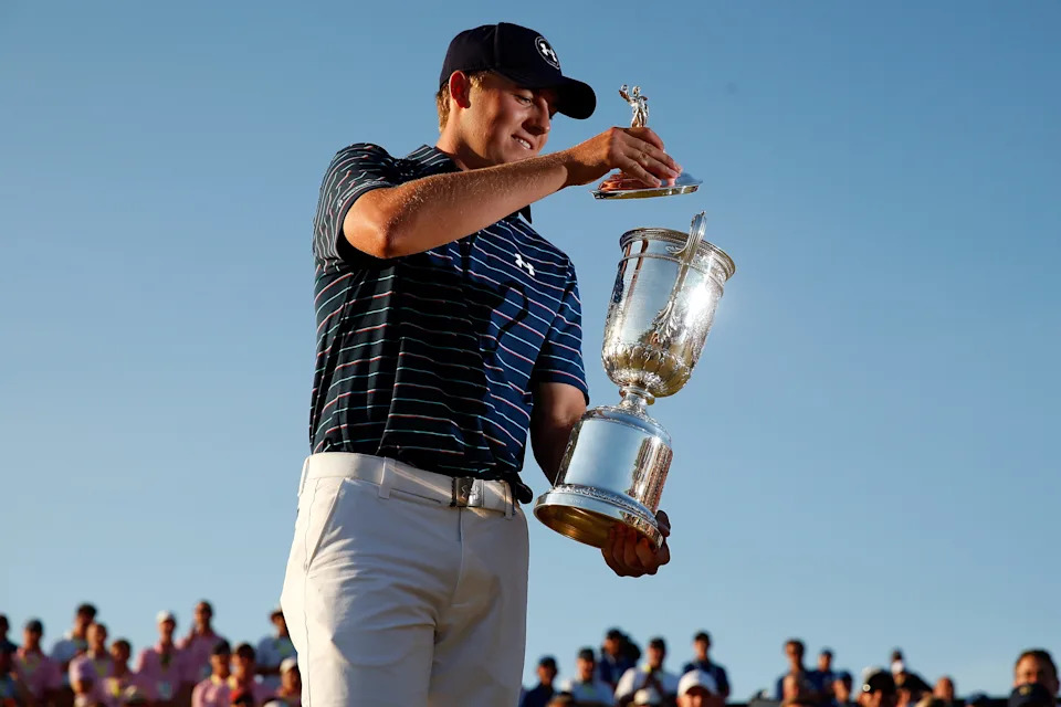 Jordan Spieth of the United States poses with the trophy for photographers after winning the 115th U.S. Open Championship at Chambers Bay on June 21, 2015 in University Place, Washington.