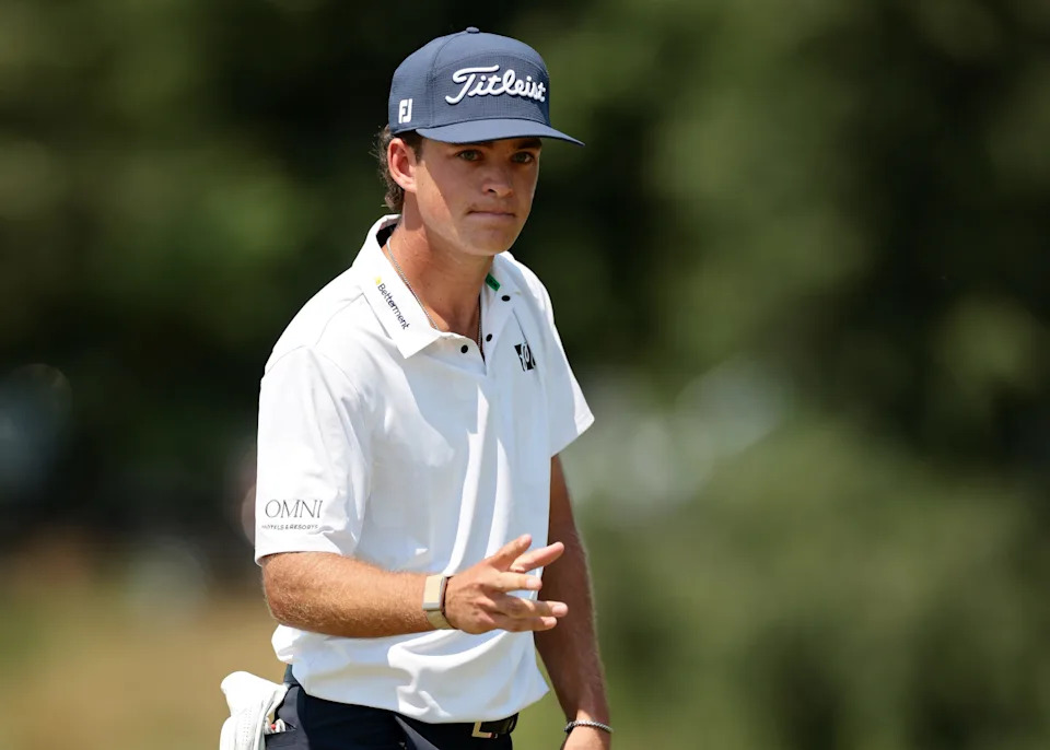 Jackson Koivun acknowledges the crowd after making birdie on the fourth green during the final round of the 2026 3M Open at TPC Twin Cities.