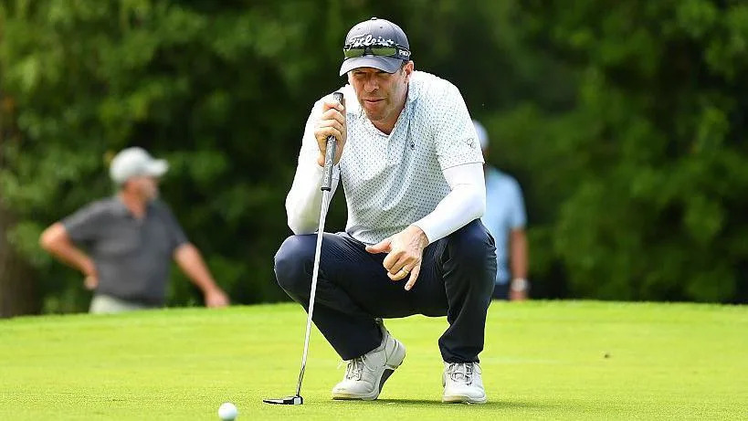 Bradley Dredge lines up a putt