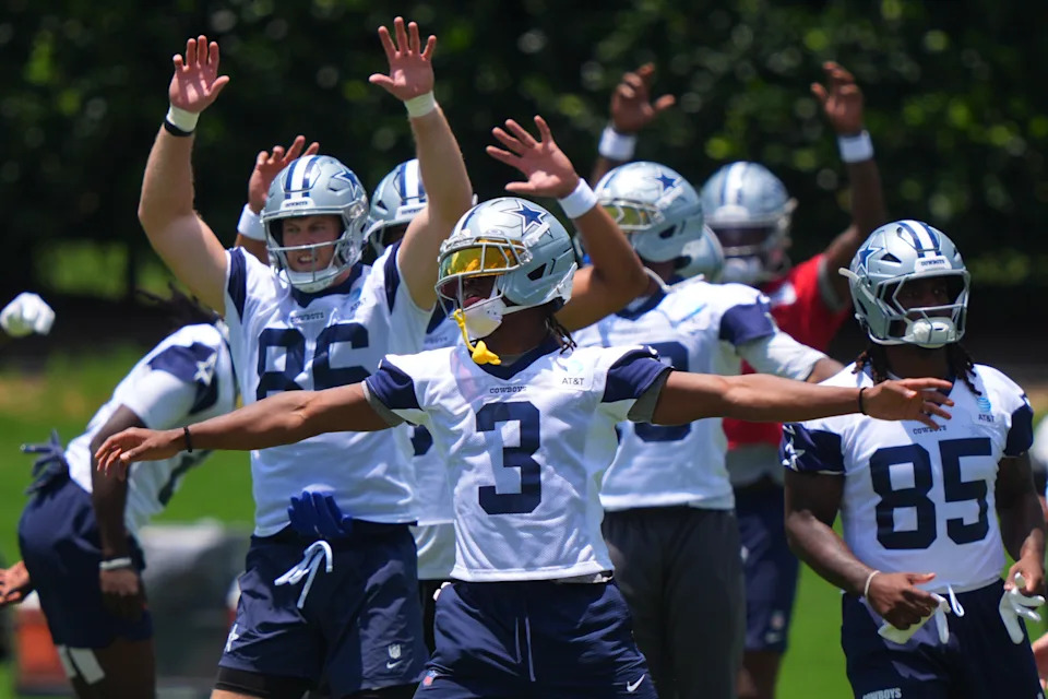 Dallas Cowboys wide receiver George Pickens (3) stretches with teammates during NFL football practice Wednesday, June 17, 2026, in Frisco, Texas. (AP Photo/LM Otero)