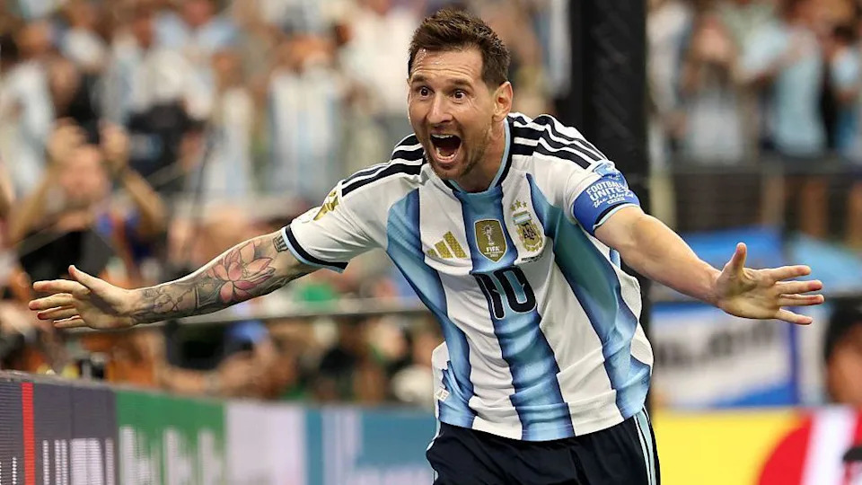 Lionel Messi celebrates with his arms stretched wide after scoring in the 2026 FIFA World Cup
