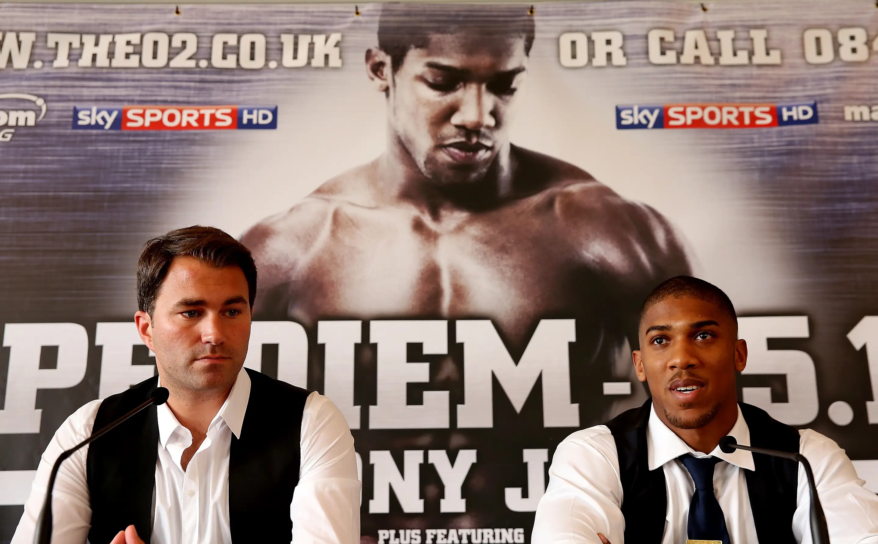 LONDON, ENGLAND - JULY 25:  Anthony Joshua and Eddie Hearn attend a press conference to announce his signing to Matchroom on July 25, 2013 in London, England.  (Photo by Scott Heavey/Getty Images)