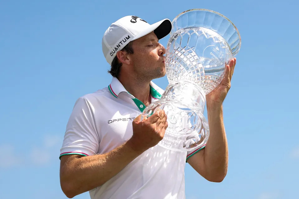 Stefano Mazzoli poses with the trophy after winning the 2026 Corales Puntacana Championship at Puntacana Resort & Club.