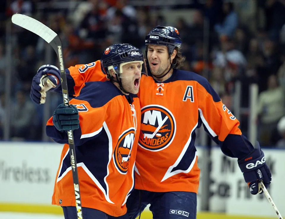 The Islanders used to wear an orange sweater in the 2000s. neil miller