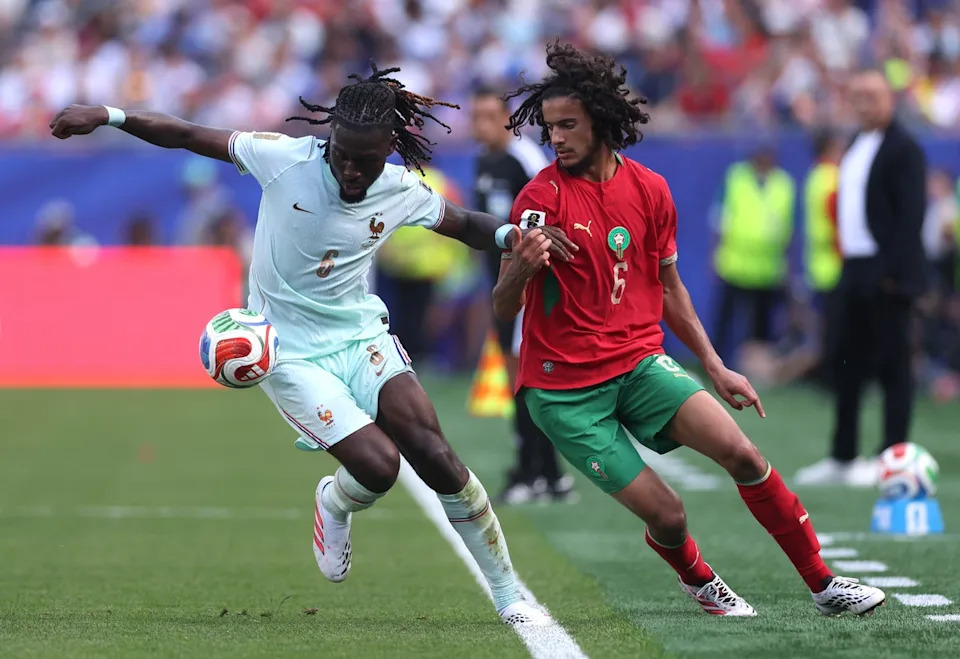 Ayyoub Bouaddi is held off by Manu Kone (Getty)