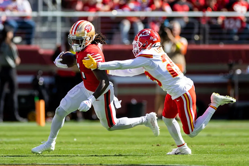 SANTA CLARA, CA - OCTOBER 23: San Francisco 49ers wide receiver Brandon Aiyuk (11) gets pulled down during the NFL professional football game between the Kansas City Chiefs and San Francisco 49ers on October 23, 2022 at Levi’s Stadium in Santa Clara, CA. (Photo by Bob Kupbens/Icon Sportswire)