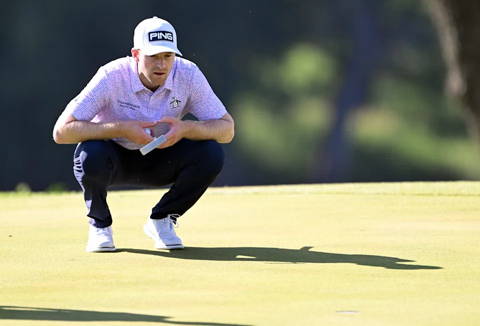 Brian Campbell lines up a putt on the 15th hole during the first round of the John Deere Classic golf tournament.