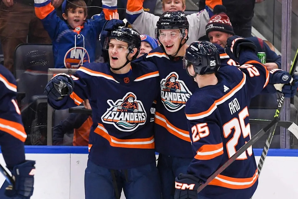 Islanders defenseman <a class="link " href="https://sports.yahoo.com/nhl/players/6777/" data-i13n="sec:content-canvas;subsec:anchor_text;elm:context_link" data-ylk="slk:Sebastian Aho;sec:content-canvas;subsec:anchor_text;elm:context_link;itc:0" data-yga="{"yLinkElement":"context_link","yModuleName":"content-canvas","yLinkText":"Sebastian Aho","ySubModuleName":"anchor_text","yHasCommerce":false}">Sebastian Aho</a> (25) and New York Islanders defenseman <a class="link " href="https://sports.yahoo.com/nhl/players/5402/" data-i13n="sec:content-canvas;subsec:anchor_text;elm:context_link" data-ylk="slk:Scott Mayfield;sec:content-canvas;subsec:anchor_text;elm:context_link;itc:0" data-yga="{"yLinkElement":"context_link","yModuleName":"content-canvas","yLinkText":"Scott Mayfield","ySubModuleName":"anchor_text","yHasCommerce":false}">Scott Mayfield</a> (24) celebrate the goal by New York Islanders center <a class="link " href="https://sports.yahoo.com/nhl/players/6758/" data-i13n="sec:content-canvas;subsec:anchor_text;elm:context_link" data-ylk="slk:Mathew Barzal;sec:content-canvas;subsec:anchor_text;elm:context_link;itc:0" data-yga="{"yLinkElement":"context_link","yModuleName":"content-canvas","yLinkText":"Mathew Barzal","ySubModuleName":"anchor_text","yHasCommerce":false}">Mathew Barzal</a> (13) against the <a class="link " href="https://sports.yahoo.com/nhl/teams/pittsburgh/" data-i13n="sec:content-canvas;subsec:anchor_text;elm:context_link" data-ylk="slk:Pittsburgh Penguins;sec:content-canvas;subsec:anchor_text;elm:context_link;itc:0" data-yga="{"yLinkElement":"context_link","yModuleName":"content-canvas","yLinkText":"Pittsburgh Penguins","ySubModuleName":"anchor_text","yHasCommerce":false}">Pittsburgh Penguins</a> during the second period at UBS Arena. USA TODAY Sports